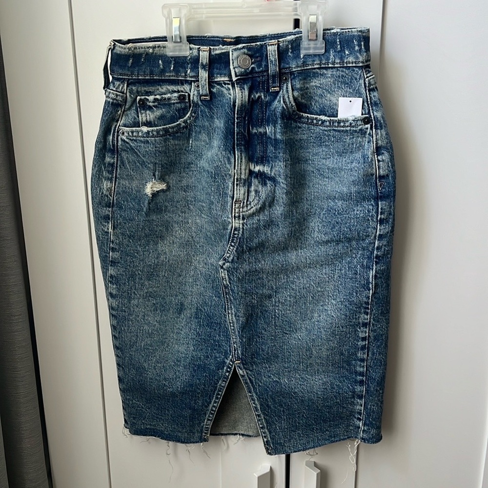 Knee length denim skirt in size 24